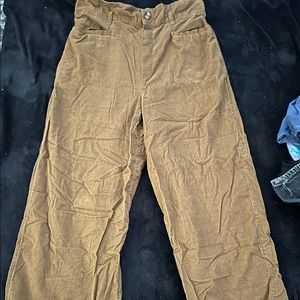 American Eagle, size Large. Much darker brown in person more like a coffee color